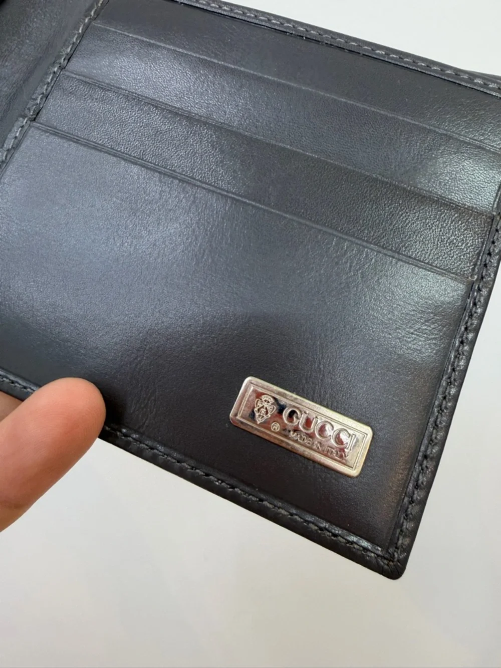 Gucci Classic Men's grey Leather Bifold Wallet with Corner Metal Accents